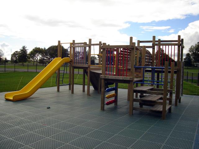 Outdoor playground with slide and platforms